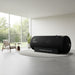 Henshaw 1662 Hyperbaric Oxygen Chamber placed in a bright minimalist room with garden views, ideal for wellness and home therapy.