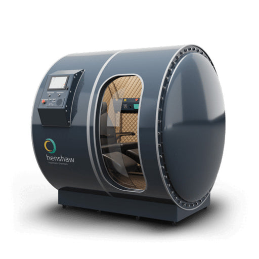 Studio-rendered image of the Henshaw Duoplace Hyperbaric Chamber with transparent entry, dual seating capacity, and curved aluminium body.