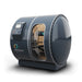 Studio-rendered image of the Henshaw Duoplace Hyperbaric Chamber with transparent entry, dual seating capacity, and curved aluminium body.