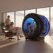 Henshaw Monozen Hyperbaric Chamber in a high-rise city apartment with a man undergoing oxygen therapy, creating a premium wellness experience at home.