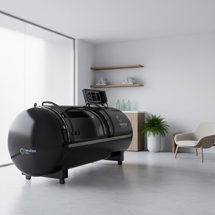 Modern wellness room setup with Henshaw Pro Hyperbaric Oxygen Chamber, showcasing a premium pressurised chamber for at-home oxygen therapy.