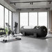 Henshaw Solo Hyperbaric Oxygen Chamber set in a modern gym space, ideal for athletic recovery, sports therapy, and wellness enhancement.