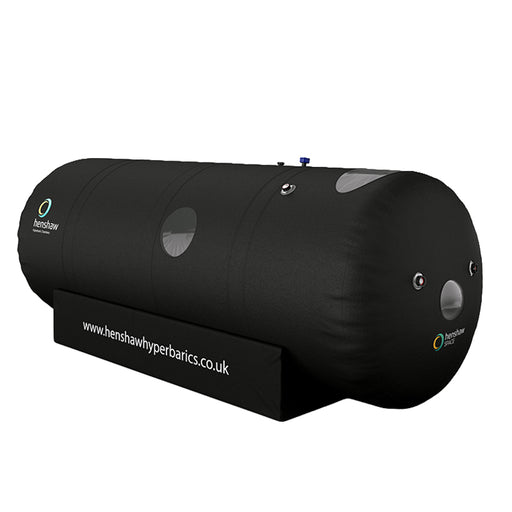 Isolated view of the Henshaw Space Hyperbaric Oxygen Chamber showing its cylindrical design, control valves, and durable build for therapeutic use.