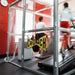 Hypoxico Hypoxic Altitude Chamber premium altitude room with white curved surround, clear glass panels, treadmill, elliptical, and vibration plate visible inside, branding on front wall.