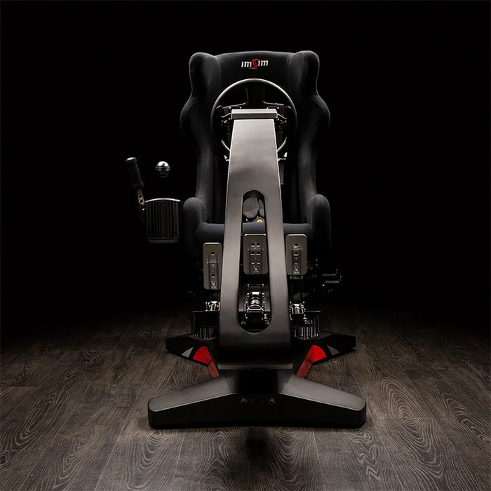 Front view of the ImSim ALMA racing simulator with integrated racing seat, steering position and pedal layout.