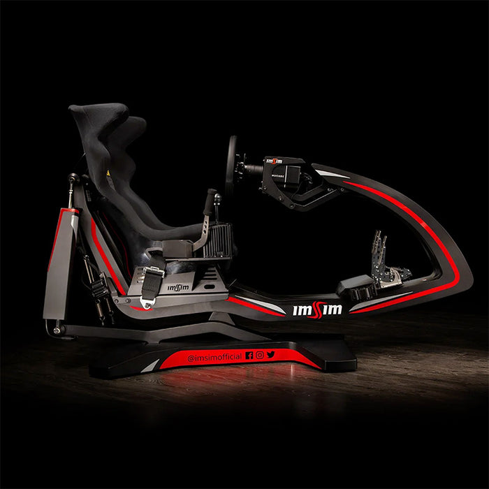 Full side profile of the ImSim ALMA racing simulator with ergonomic racing seat, wheel mount and pedal platform.