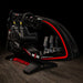 Three-quarter view of the ImSim ALMA racing simulator featuring racing pedals, steering wheel and premium cockpit frame.