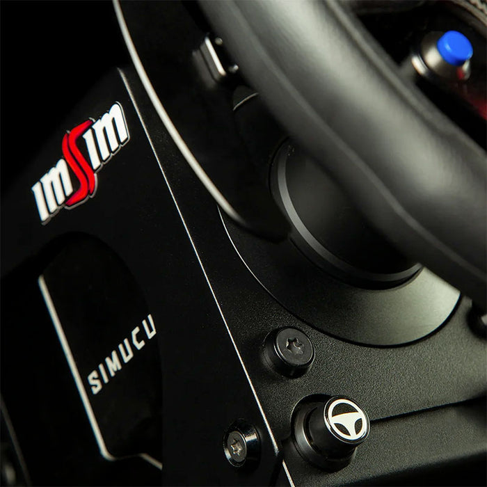 Close-up of the ImSim ALMA racing simulator wheel base mount with precision-machined aluminium housing.