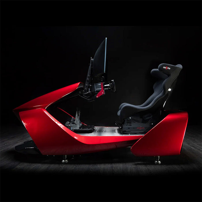 Side profile of the ImSim GARRA podium racing simulator showcasing the ergonomic racing seat, monitor mount and red cockpit chassis.
