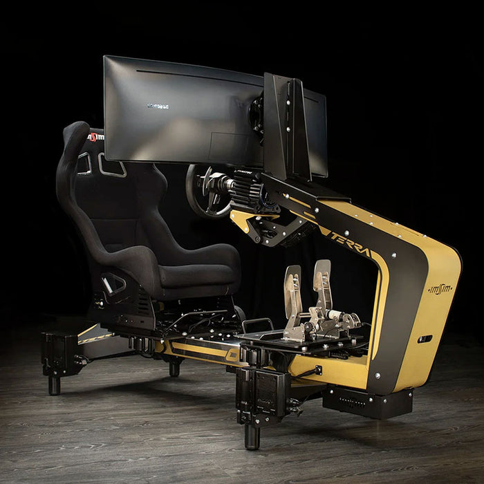 Angled front view of the ImSim TERRA professional racing simulator featuring black and gold chassis, bucket seat and monitor support.
