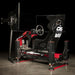 ImSim TERRA racing simulator cockpit with integrated monitor stand, bucket seat, steering wheel and pedal platform in red and black finish.