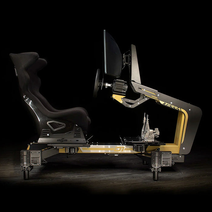 Full side view of the ImSim TERRA sim racing cockpit with integrated monitor mount, racing bucket seat and adjustable pedal system.