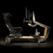 Full side view of the ImSim TERRA sim racing cockpit with integrated monitor mount, racing bucket seat and adjustable pedal system.