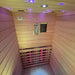 High-angle view inside the Insignia KY001 Infrared Indoor Sauna 900x900, featuring the control panel and heating elements with a warm, inviting atmosphere.