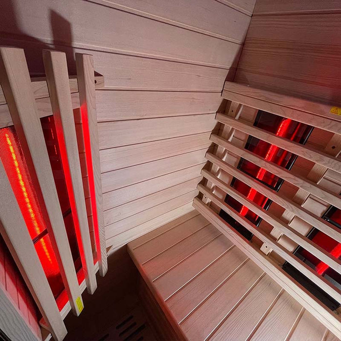 Close-up of the wooden slats and infrared heaters inside the Insignia KY001 Infrared Indoor Sauna, highlighting the durable materials and ergonomic design.