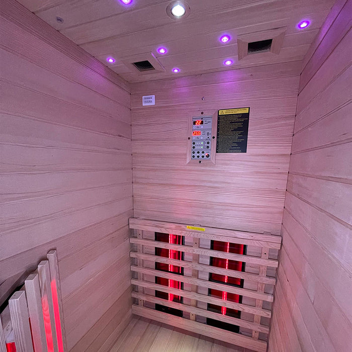 Interior shot of the Insignia KY001 Infrared Indoor Sauna 900x900 with LED lighting and infrared panels for a luxurious sauna experience.