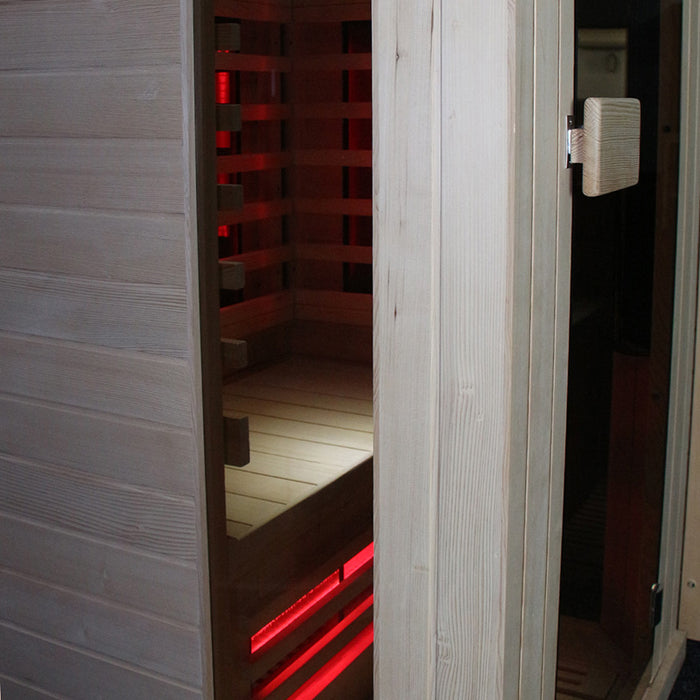 Insignia KY002 Infrared Indoor Sauna 1000 x 900 with the door ajar, revealing the inviting interior with ergonomic seating and advanced infrared heaters.