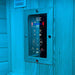 Close-up of the digital control panel in the Insignia KY003 Infrared Indoor Sauna 1000 x 1000mm, offering intuitive control over temperature, lighting, and audio settings.