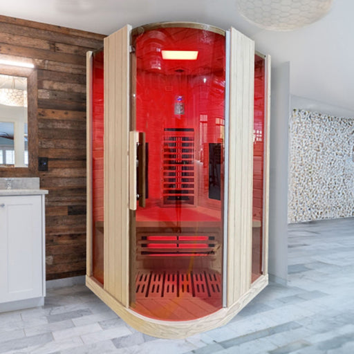 The Insignia KY003 Infrared Indoor Sauna 1000 x 1000mm installed in a modern bathroom, showcasing its premium Canadian Spruce construction and vibrant LED chromotherapy lighting.