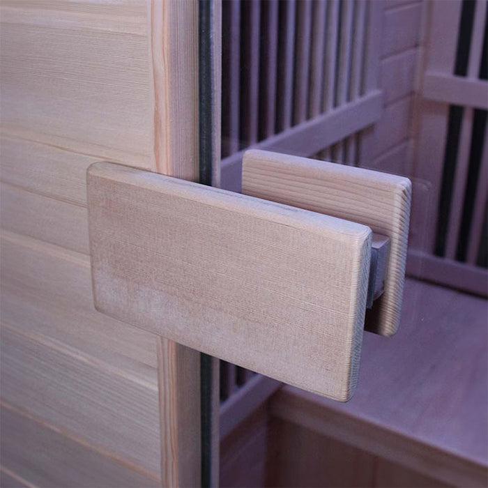 Close-up of the sturdy wooden door handle on the Insignia KY004 Infrared Indoor Sauna 900 x 900.