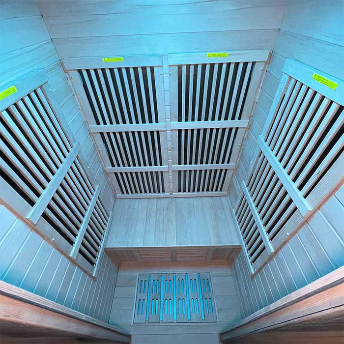 Overhead shot inside the Insignia KY004 Infrared Indoor Sauna 900 x 900, showing the spacious seating and blue LED Chromotherapy lighting.