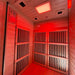 Inside view of the Insignia KY004 Infrared Indoor Sauna 900 x 900 illuminated by calming red LED Chromotherapy lighting.