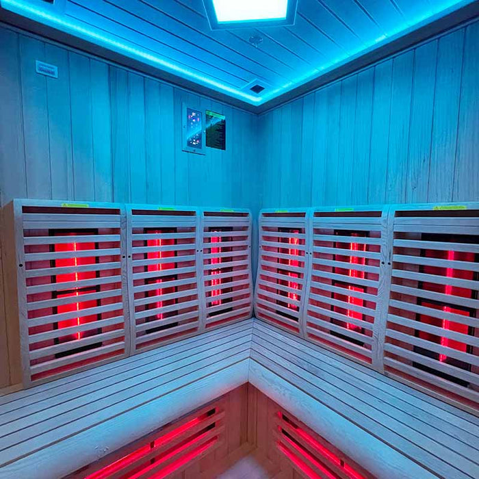 Wide-angle view of the Insignia KY006 Infrared Indoor Sauna's interior, bathed in calming blue LED Chromotherapy lighting, designed for ultimate relaxation.