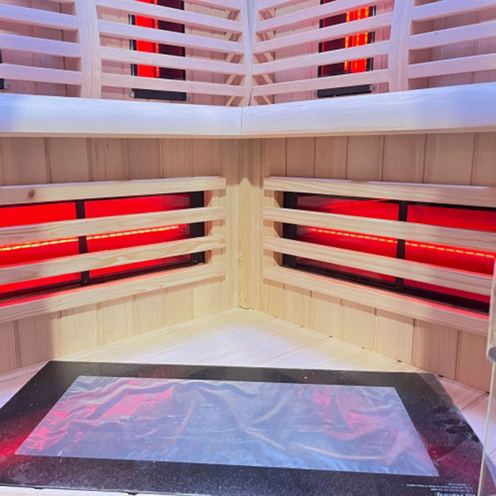 Lower bench and leg heater setup in the Insignia KY006 Indoor Infrared Sauna 1300 x 1300mm, with carbon fibre panels and footwell heating zone.