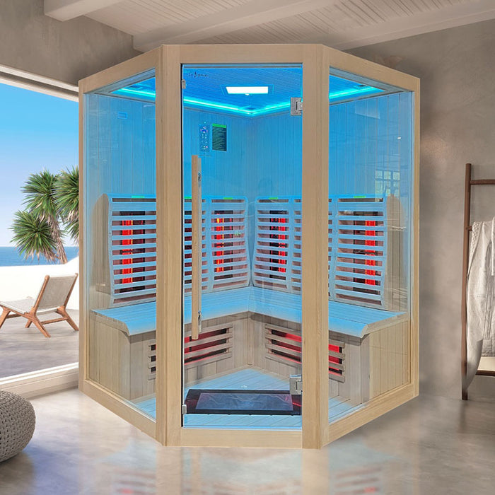 The Insignia KY006 Infrared Indoor Sauna in a serene beachside home setting, showcasing its elegant design, spacious interior, and soothing LED Chromotherapy lighting.