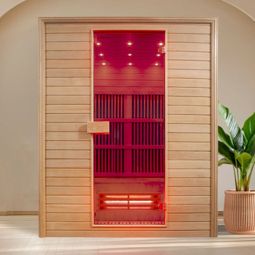 Stylish front view of the Insignia KY008 Infrared Indoor Sauna 1300 x 1000 set in a modern room with plant décor and ambient lighting.