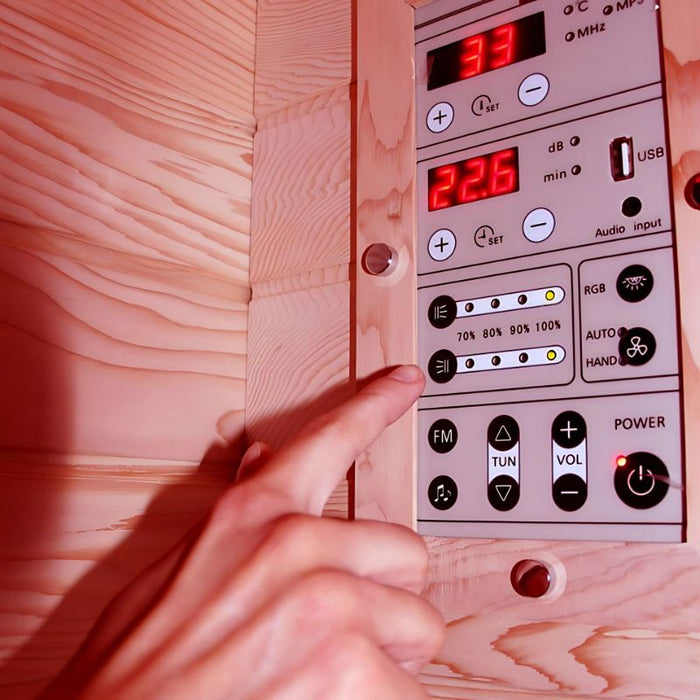 Advanced digital control panel of the Insignia KY009 Infrared Indoor Sauna 1500 x 1000, featuring temperature settings, light control and built-in audio options.