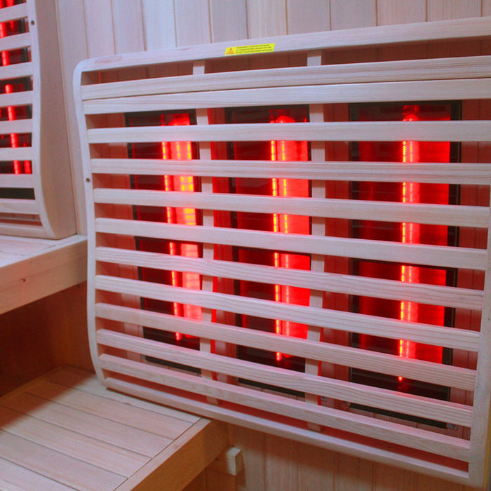 Close-up of the large ergonomic backrest in the Insignia KY2216 Infrared Sauna, with infrared heaters in the background for targeted heat relief.