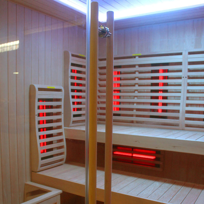 Close-up of the entrance to the Insignia KY2216 Infrared Indoor Sauna, highlighting the sturdy tempered glass door with ergonomic wooden handle.