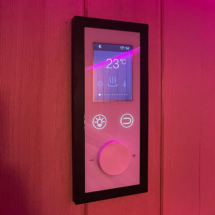 Close-up of the wooden paneling inside the Insignia Infrared Sauna illuminated with soothing pink Chromotherapy lighting.