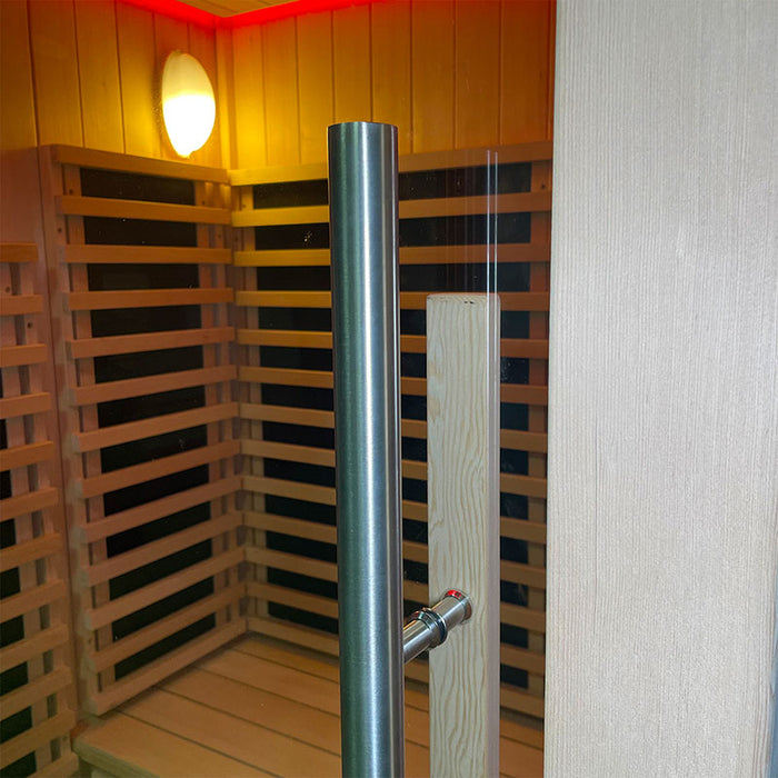 A sleek and modern handle design on the glass door of the Insignia Outdoor Infrared Sauna 1500 x 1300mm for easy access and added elegance.