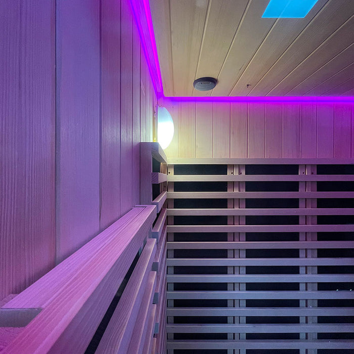 Pink LED lighting creating a soothing ambiance inside the Insignia Outdoor Infrared Sauna 1500 x 1300mm, enhancing mood and relaxation.