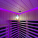 The Insignia Outdoor Infrared Sauna 1500 x 1300mm features soothing purple chromotherapy lighting, showcasing the wooden slat design and integrated wall-mounted light for an inviting, tranquil ambiance.