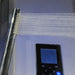 Chrome hand shower in use with the digital touch control panel inside the Insignia Platinum 1150 x 850 steam cabin.