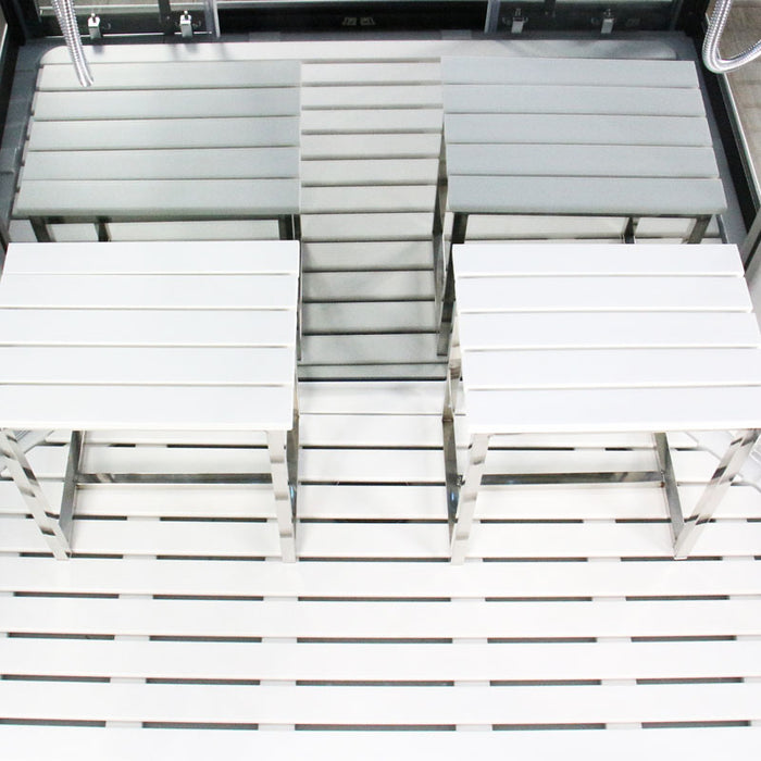 Interior bench seating and acrylic flooring inside the Insignia Platinum Rectangle Steam Shower 1400 x 900, featuring a clean and stylish slatted design.