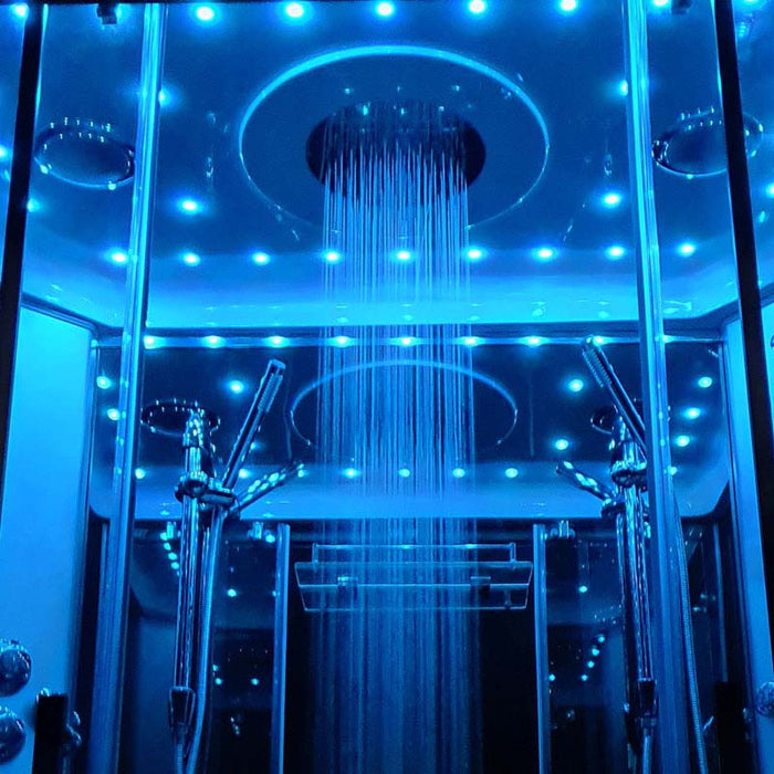 Soothing overhead rainfall shower with blue LED lights in the Insignia 1400 x 900 Rectangle Steam Cabin.