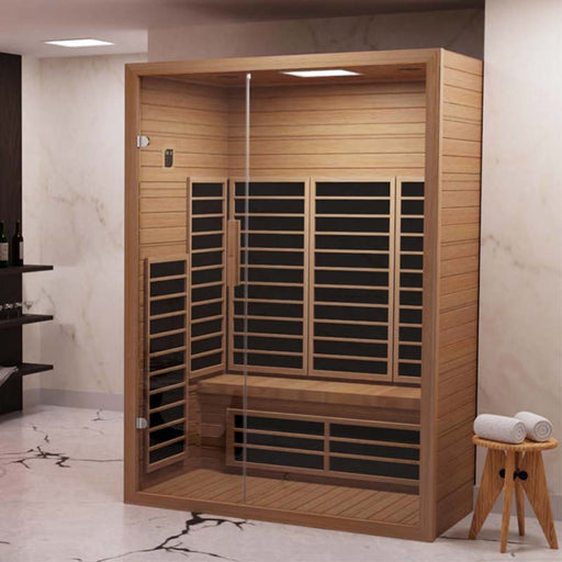 Modern home sauna installation in a stylish bathroom, featuring premium infrared heating technology and a full-glass door for a sleek aesthetic.