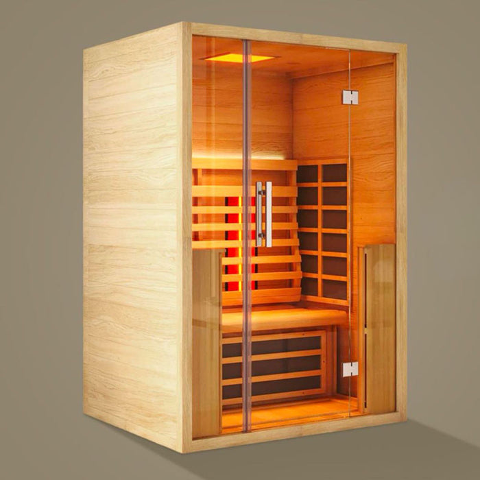 Side-angle view of the Jaquar Paire 2-person sauna with internal lighting and heaters illuminated, highlighting its natural wood finish.