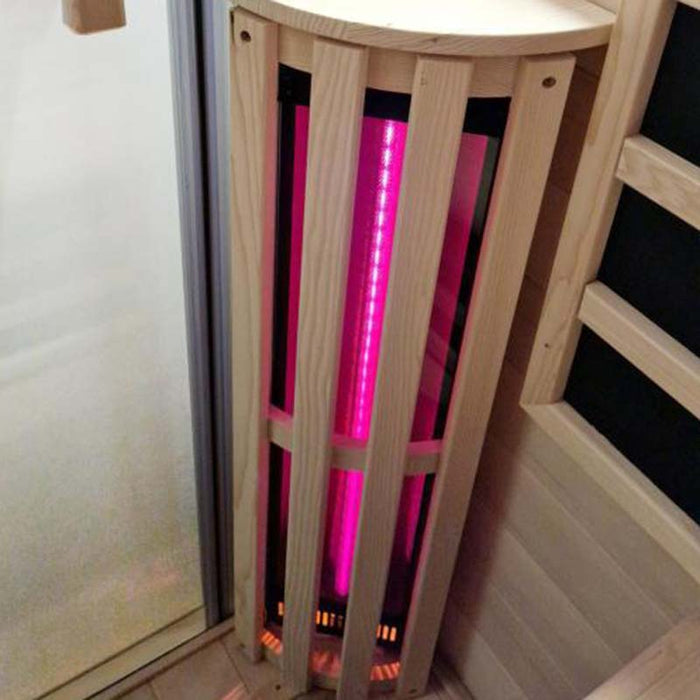 Infrared carbon heater with a protective wooden cover inside the Jaquar Relaxo sauna, designed to distribute heat evenly for an immersive sauna experience.