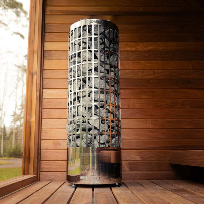 Harvia heater installed inside the Jonas Grand 8-person sauna, surrounded by natural timber walls and flooring for optimal heat distribution.