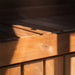Close-up detail of the smooth wooden bench inside the Jonas Mini 3-person sauna, highlighting high-quality craftsmanship and finish.