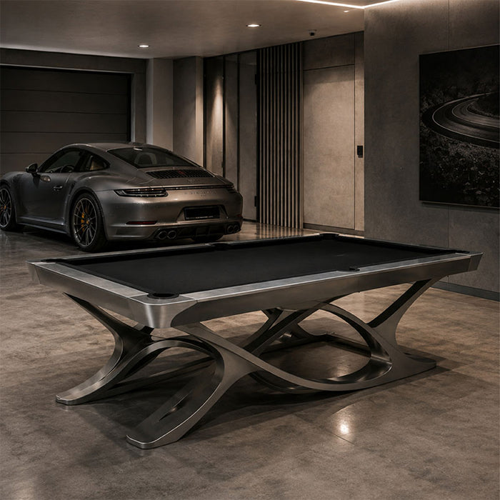 Koralturk Aristo Pool Table with black cloth and sculptural metal frame in a luxury garage games room.