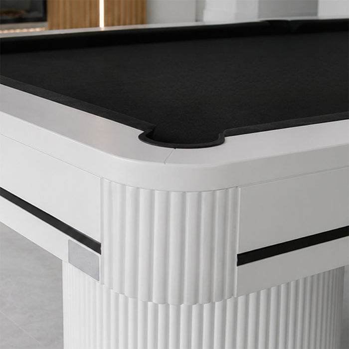 Detailed corner view of the Koralturk Elit Pool Table showcasing black cloth, white fluted trim and sleek contrasting accents.