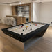 Koralturk Kaplankaya Pool Table with white cloth, angular black frame and silver base in a contemporary home games area.