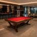 Koralturk Legnora Pool Table with red cloth, rich wooden frame and sculptural legs in a luxury contemporary games room.