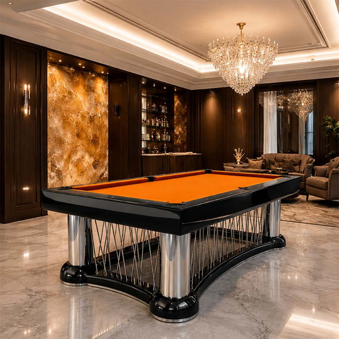 Koralturk Luxury Cage billiards table with vibrant orange cloth and chrome cage-style base in a classic luxury interior.